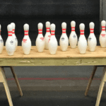 A table with bowling pins on it