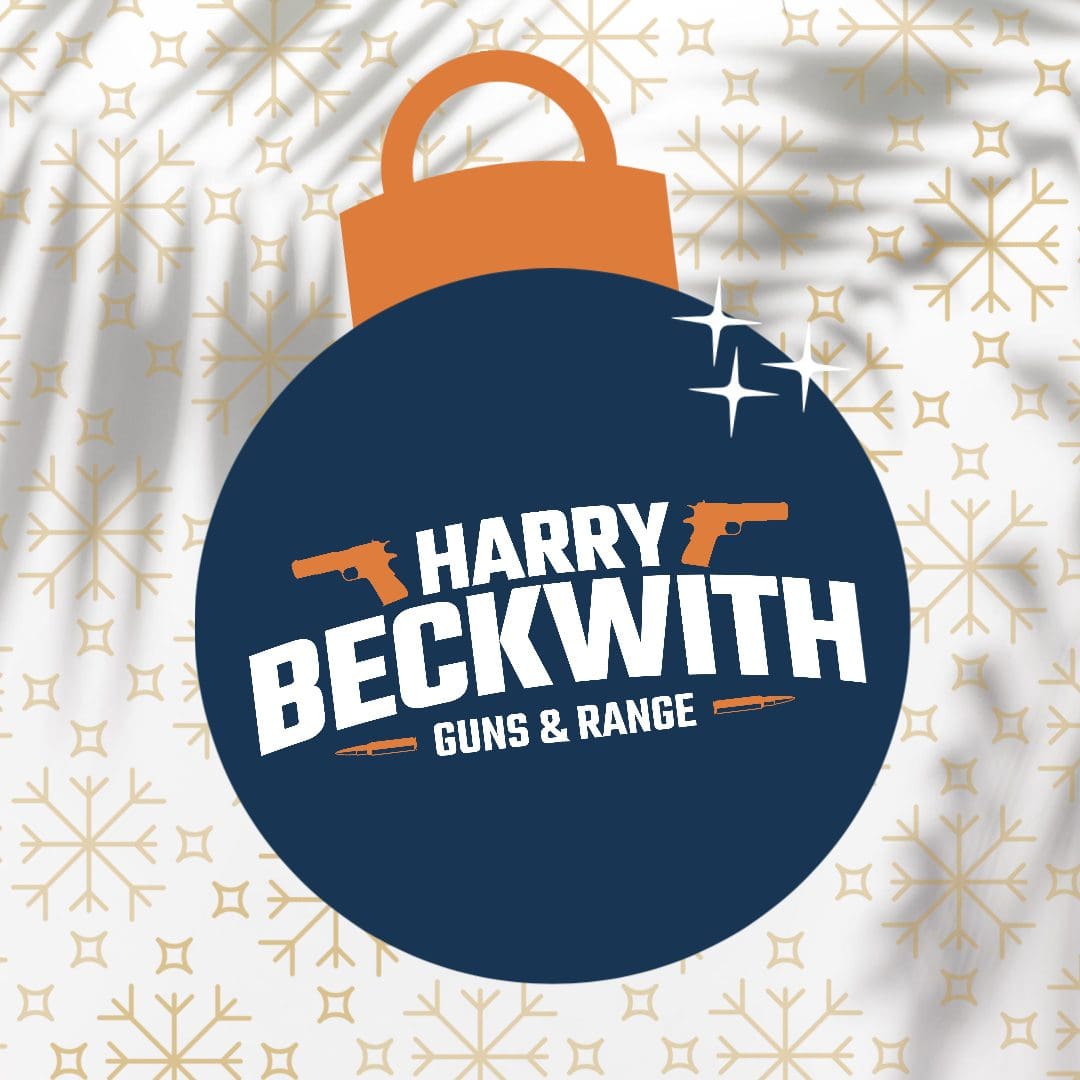 A blue and white christmas ornament with the words harry beckwith guns & range on it.