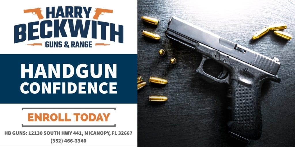 A gun and bullet shells are on the table.