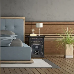 A bedroom with a bed and nightstand in it