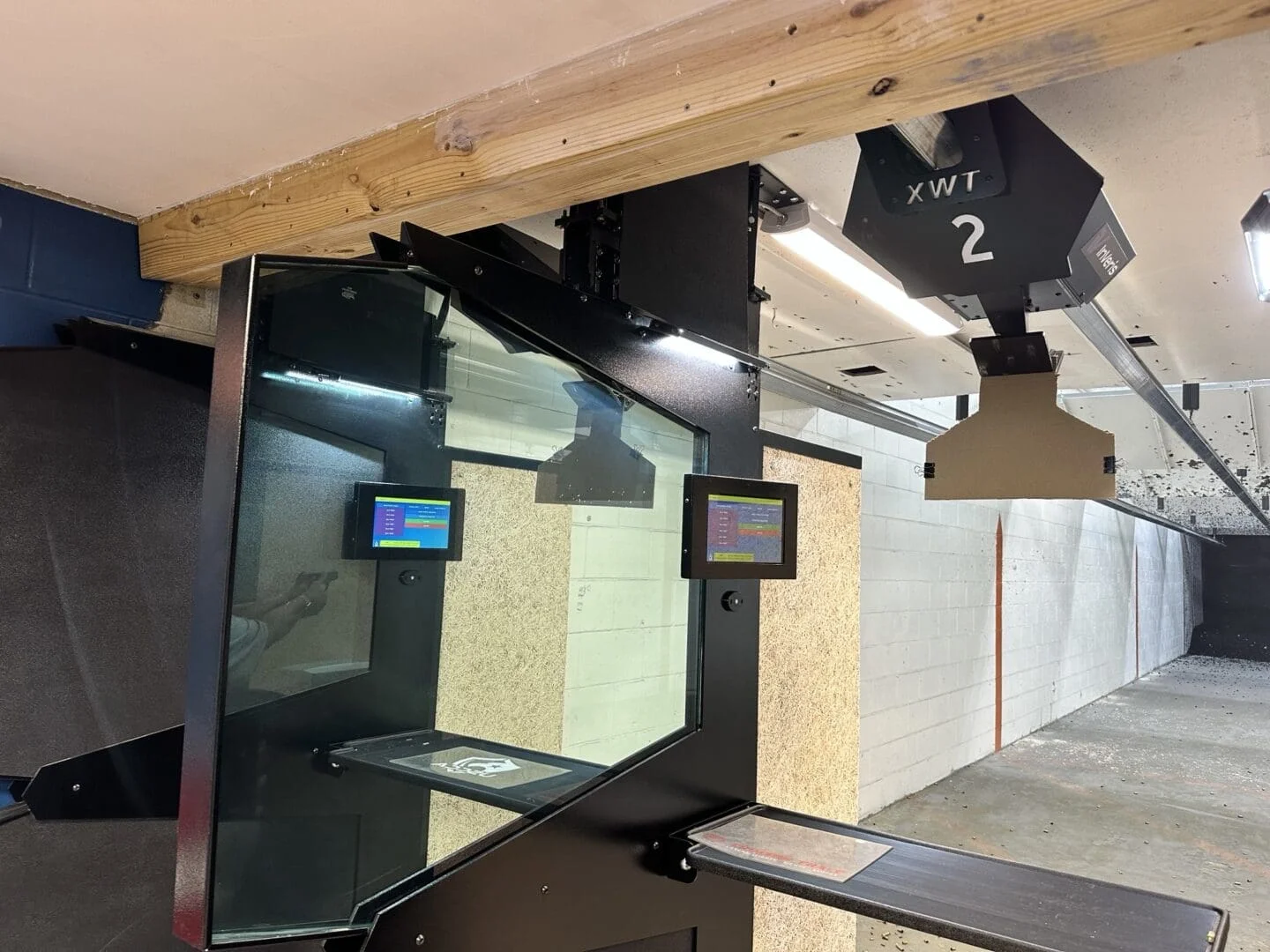 A room with two guns and a mirror